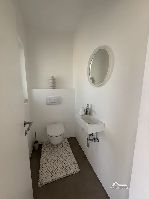 Gäste-WC auf der Wohnebene, Einfamilienhaus in Plesching