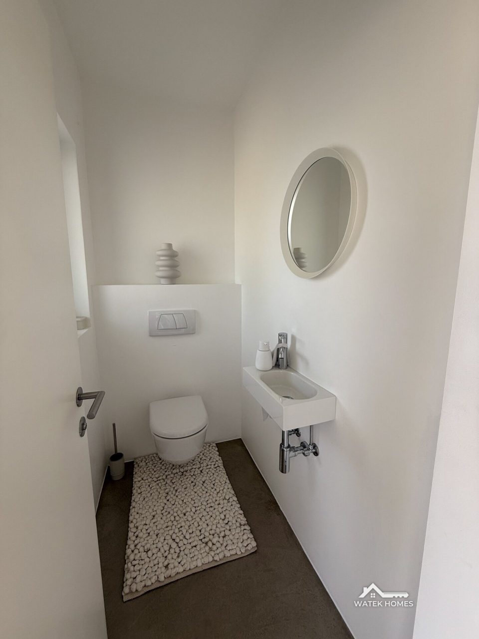 Gäste-WC auf der Wohnebene, Einfamilienhaus in Plesching